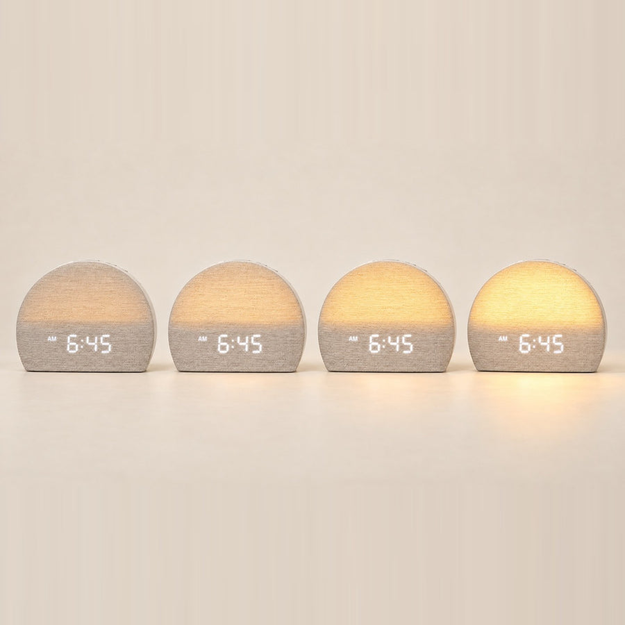 Four Sunrise Clocks showing how the light builds before the alarm