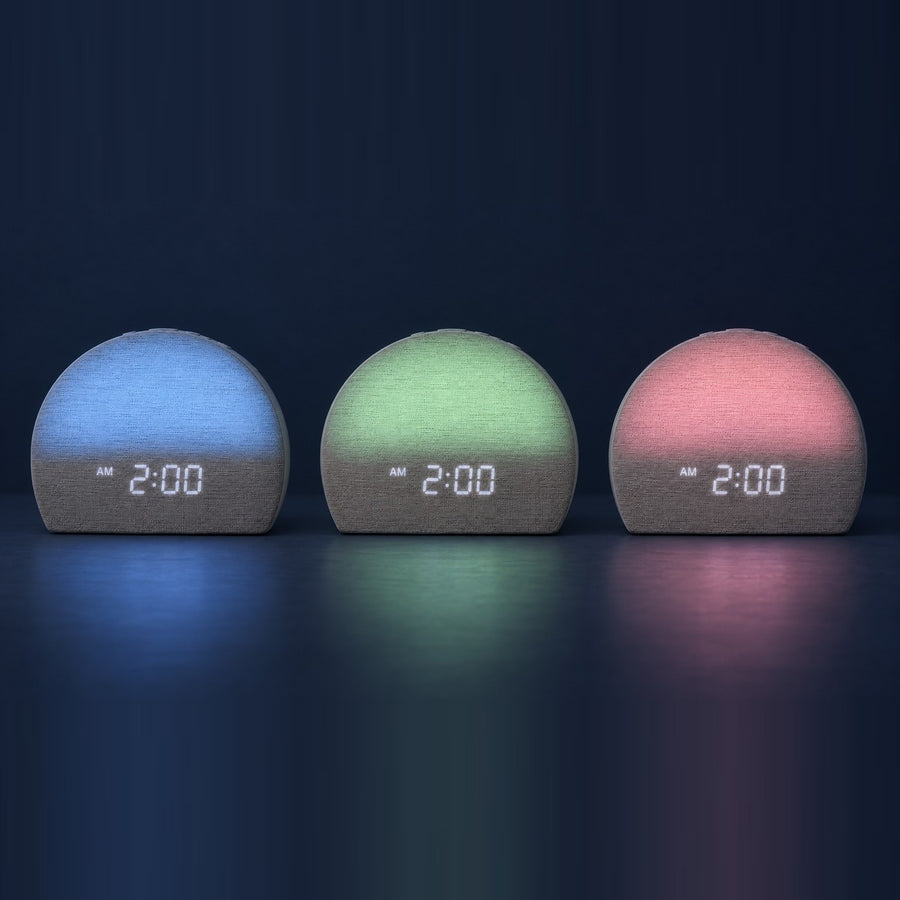 Three Sunrise Clocks glowing soft night-light colours